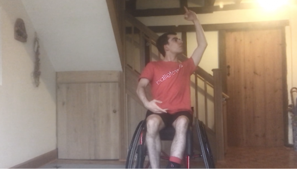 man in wheelchair dancing